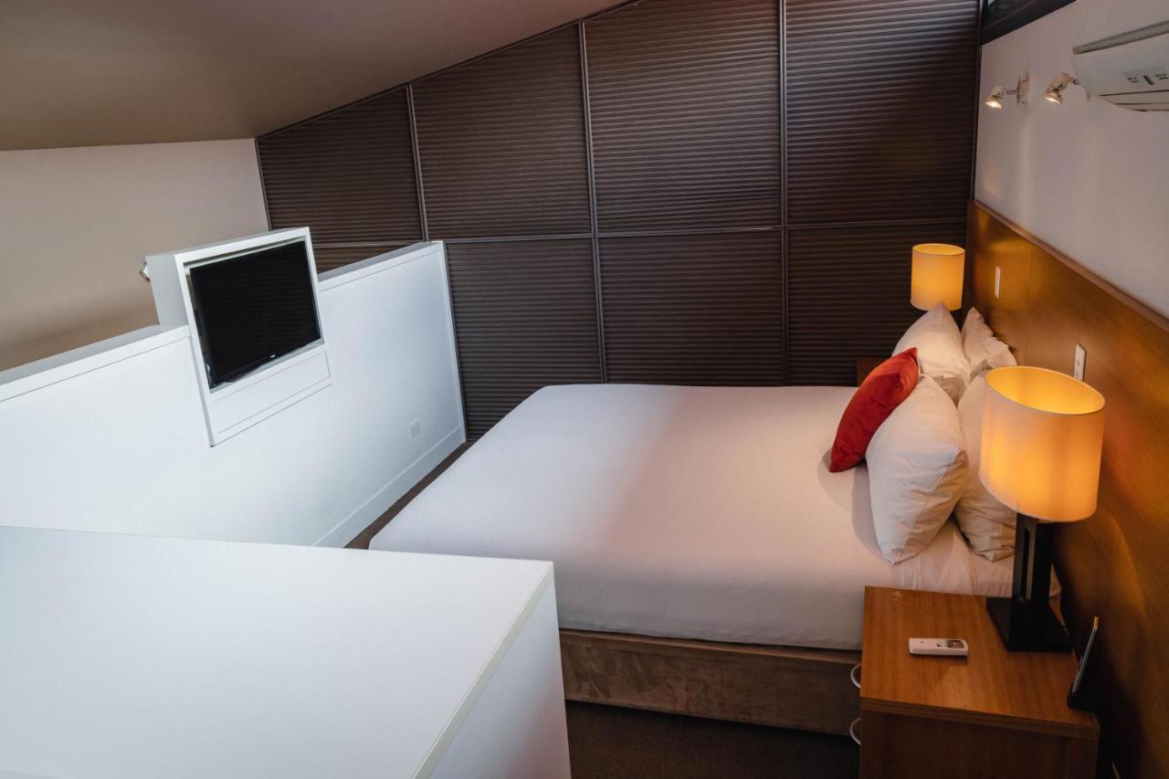 The Henry Jones Art Hotel Hobart Ngoại thất bức ảnh A bedroom in a typical apartment
